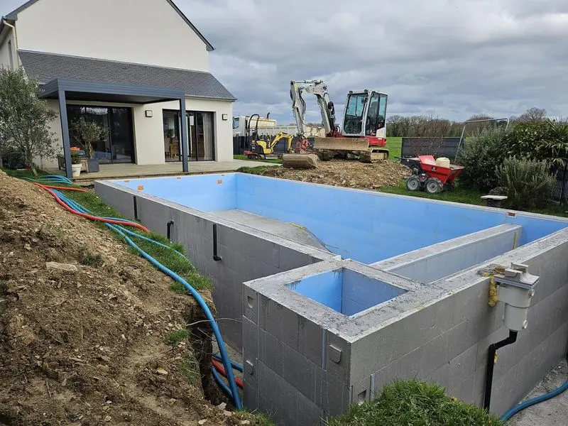 chantier piscine remblais drain