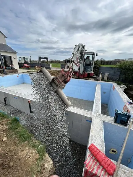 chantier piscine remblais drain