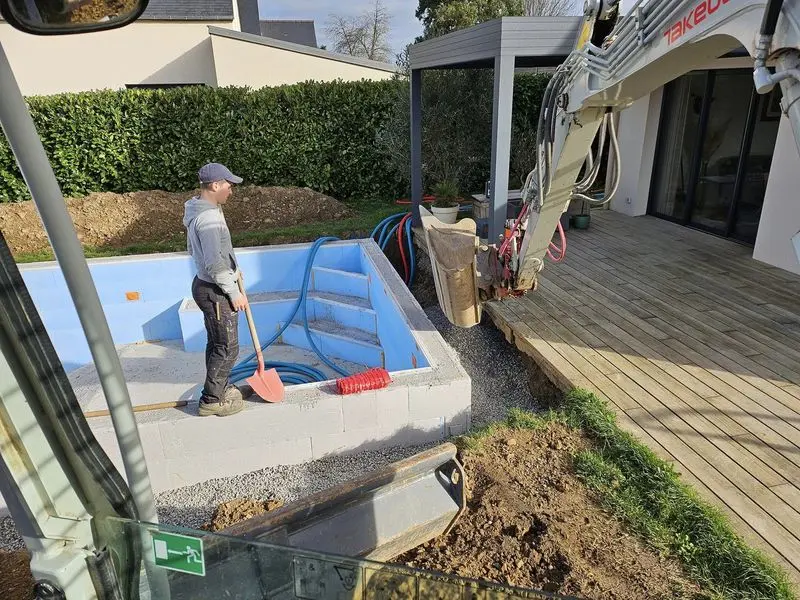 chantier piscine remblais drain