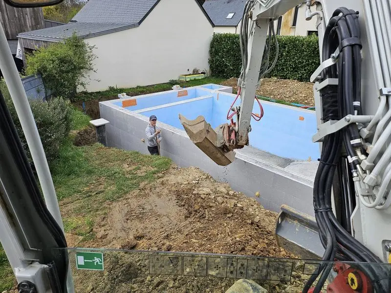 chantier piscine remblais drain