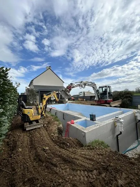 chantier piscine remblais drain