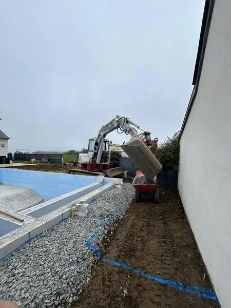chantier piscine remblais drain